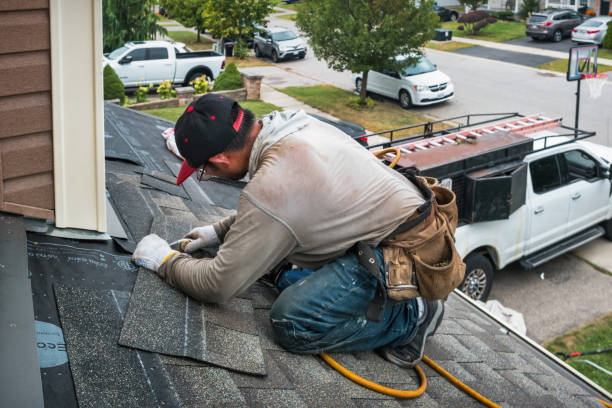 Professional Flat Roof Repair technician working in Foster, OR